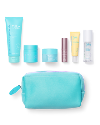 Tula skincare products including bottles, jars, and a pouch on a white background