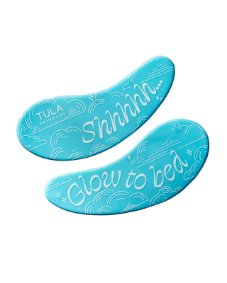 Two TULA eye patches on a transparent background with the words "SHHH...." and "GLOW TO BED" printed on them
