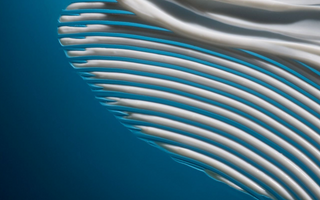 Close-up of white toothpaste on a blue background