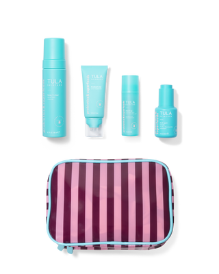 Tula skincare products including bottles and a striped pouch on a transparent background