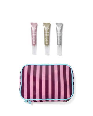 Striped travel case with three skincare products on a transparent background