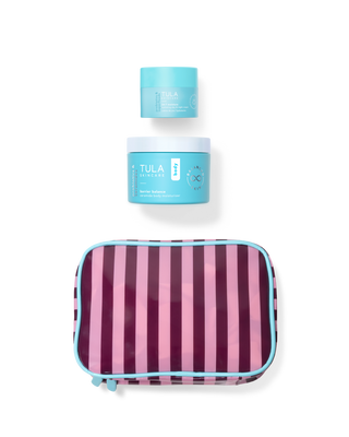 Two jars of Tula product with a striped pouch on a transparent background