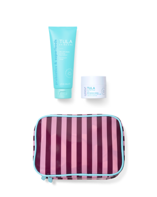TULA skincare products including a tube and a jar with a striped pouch on a transparent background