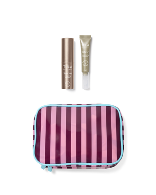 Striped travel pouch with TULA skincare products on a transparent background