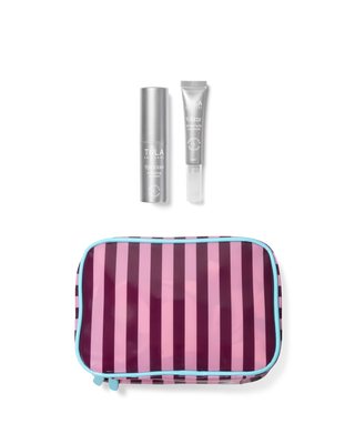 Striped travel pouch with two silver bottles on a transparent background