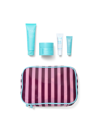 Set of skincare products with a striped carrying case on a transparent background
