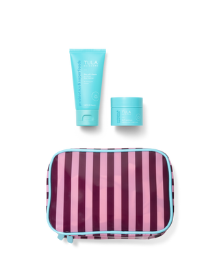 Two blue skincare products and a striped pink and purple pouch on a transparent background