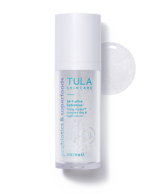 Tula skincare serum bottle on a white background