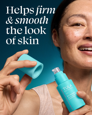 Woman holding a blue Tula skincare product with text about skin firmness and smoothness.