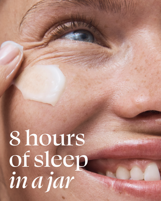 Woman applying lotion with copy overlay that reads "8 hours of sleep in a jar" 