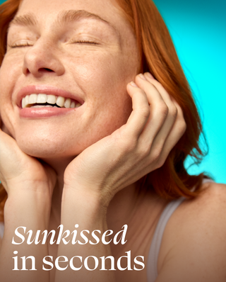 Woman with red hair smiling with hands on face against a blue background, text 'Sunkissed in seconds' below.