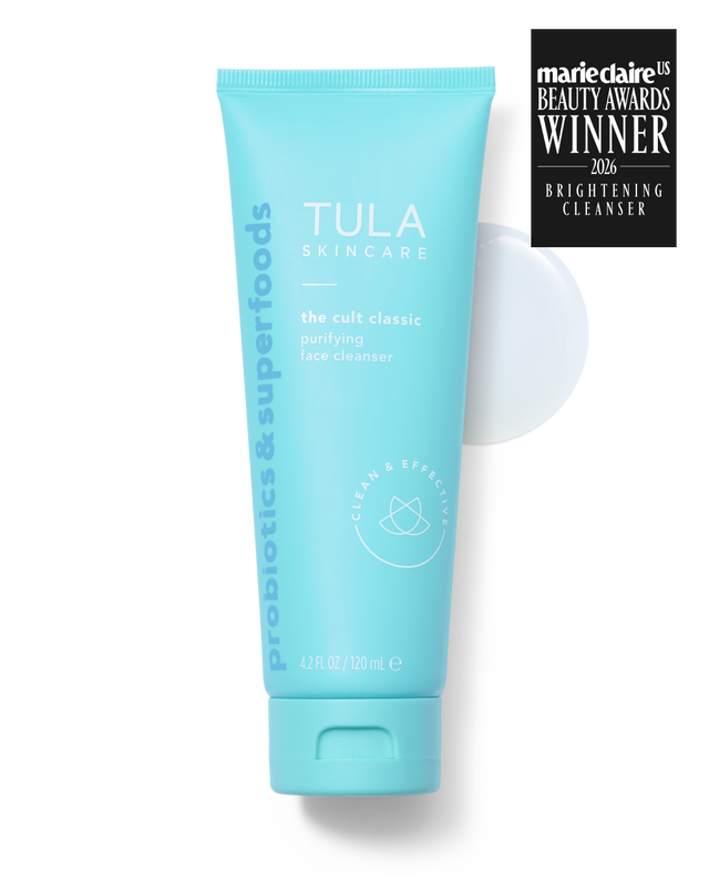 A light blue tube of Tula Skincare probiotics and superfoods purifying face cleanser, shown on a white background with a black Marie Claire Beauty Awards 2026 Brightening Cleanser winner badge in the top right corner.