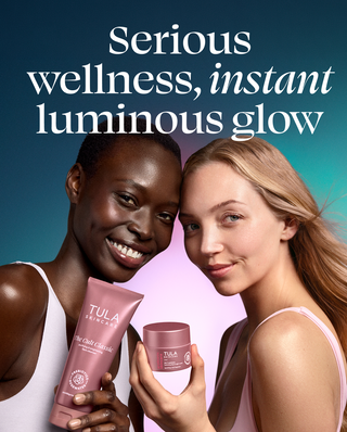 Two women holding Tula skincare products with a gradient background
