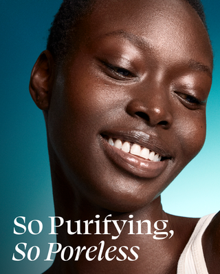 Woman with a radiant smile against a blue gradient background with text 'So Purifying, So Poreless'.