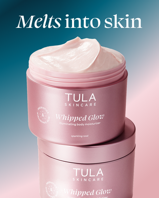 Tula Skincare Whipped Glow moisturizer with cream on top against a gradient background