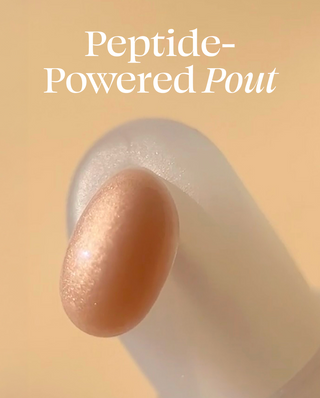 Close-up of a lip balm with 'Peptide-Powered Pout' text on a beige background