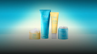 Tula skincare products on a gradient blue background