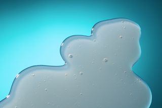 Close up of gel cleanser on blue background