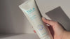 Video of TULA's "the rich rinse" nourishing cream cleanser being worked into a foamy lather